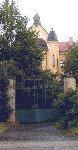 Through this gate the Lidice women with their children entered, but left only with empty arms.